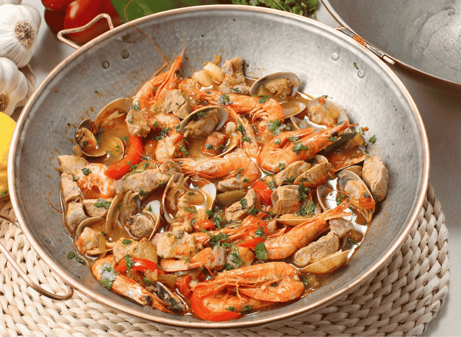 Cataplana de marisco - seafood stew in a copper cataplana pot (Faro, Algarve)